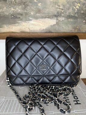 CHANEL Black Quilted Lambskin Crossbody with Silver Chain